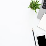 Creative flat lay photo of workspace desk. Top view office desk